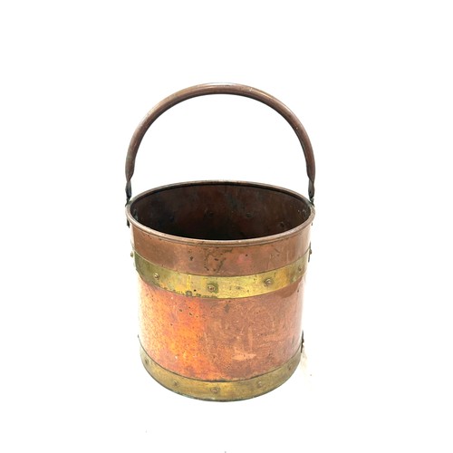 245 - Vintage brass and copper bucket, measures approximately 17 inches tall 12 inches diameter