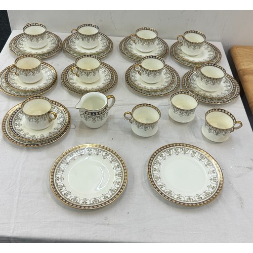 231 - Cauldonte part tea service comprising cups, saucers, milk jug etc