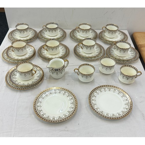 231 - Cauldonte part tea service comprising cups, saucers, milk jug etc