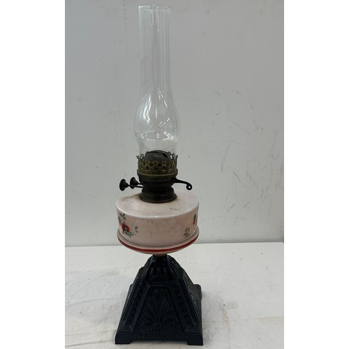 369 - Antique brass oil lamp base with metal base, approximate measurements:  height including funnel 23 i... 