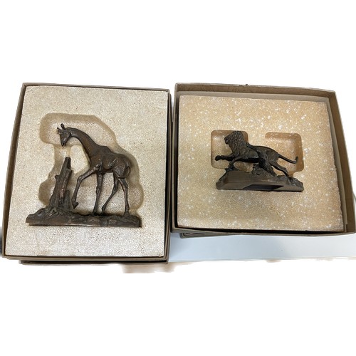 95 - Two boxed the Franklin mint Bronze figures includes a Giraffe and Lion