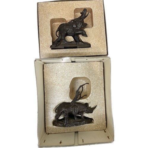 104 - Two boxed the Franklin mint Bronze figures includes a Elephant and Rhino