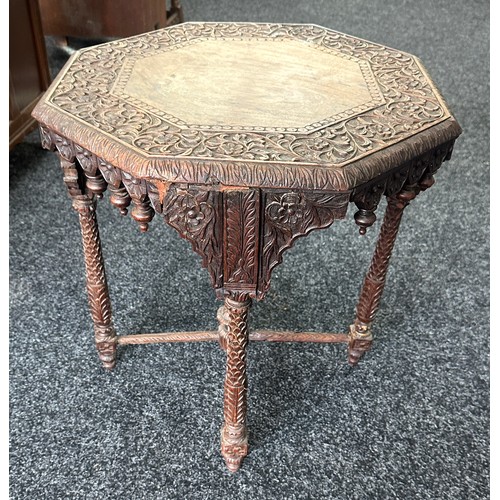 306 - Walsh and co heavily carved Indian table measures approx 21 inches tall by 20 diameter