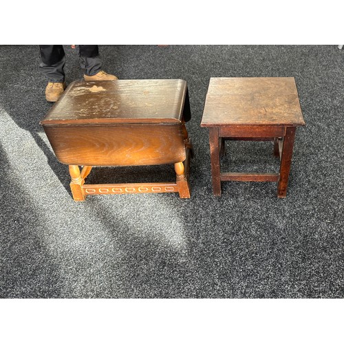 310 - Two oak lamp tables largest measures approx 16 inches tall by 20 wide and 28 deep when extended