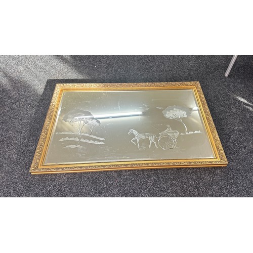 326 - Large gilt framed etched mirror measures approx 35 inches tall by 52.5 inches wide