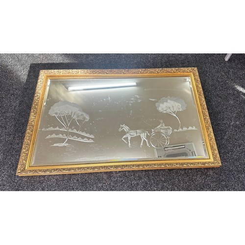 326 - Large gilt framed etched mirror measures approx 35 inches tall by 52.5 inches wide