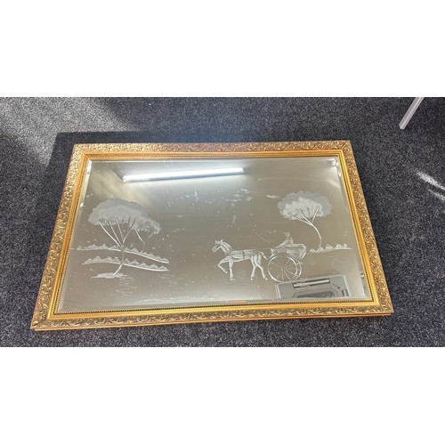 326 - Large gilt framed etched mirror measures approx 35 inches tall by 52.5 inches wide