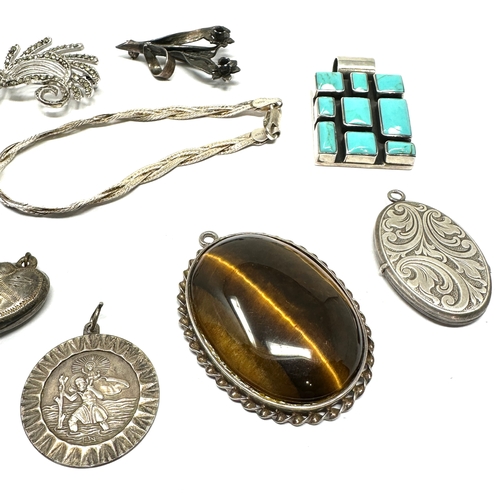 239 - selection of silver jewellery includes pendants  bracelet etc weight 80g