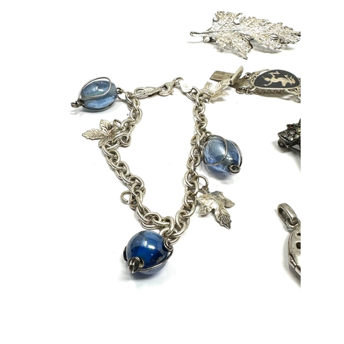 240 - selection of silver jewellery includes pendant  & bracelet brooches etc weight 67g