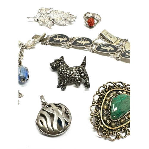 240 - selection of silver jewellery includes pendant  & bracelet brooches etc weight 67g