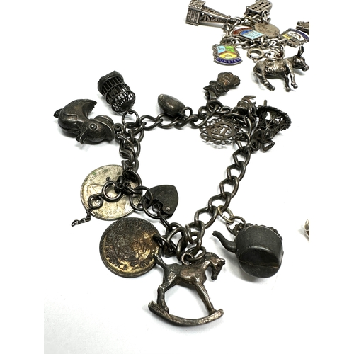 244 - selection of 3 silver charm bracelets weight 93g