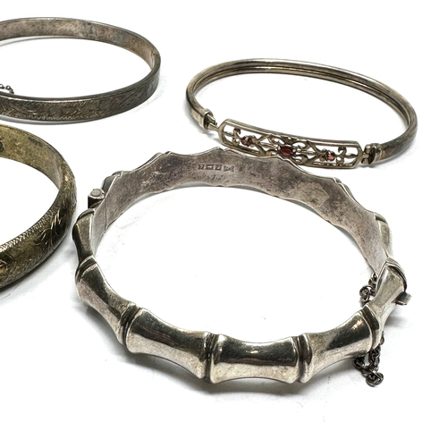 247 - selection of 4 silver bangles weight 50g