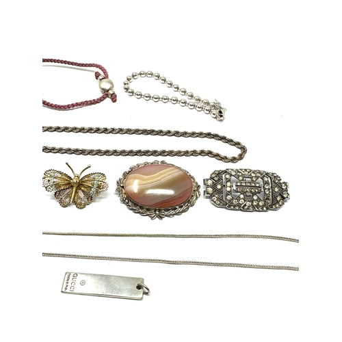 249 - selection of silver  jewellery includes  pendant brooches  necklace etc weight 102g