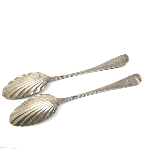 10 - Pair of 18th century silver serving spoons each spoon measures appx 22cm long weight 120g