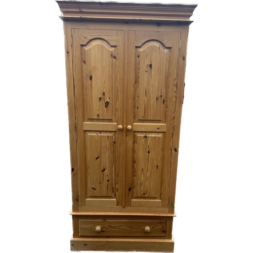 312 - 2 door 1 drawer pine wardrobe measures approximately 79 inches tall 21 inches depth