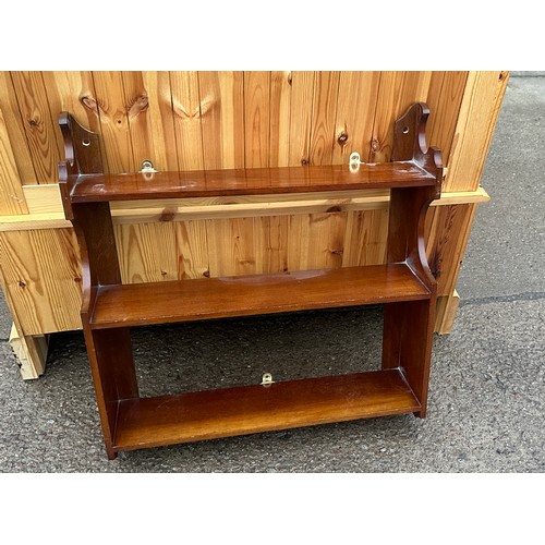 182 - mahogany wall rack measures approximately 23 inches by 23 inches by 5.5 inches