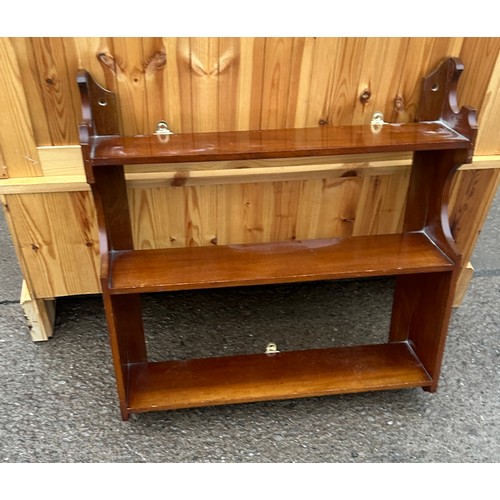 182 - mahogany wall rack measures approximately 23 inches by 23 inches by 5.5 inches