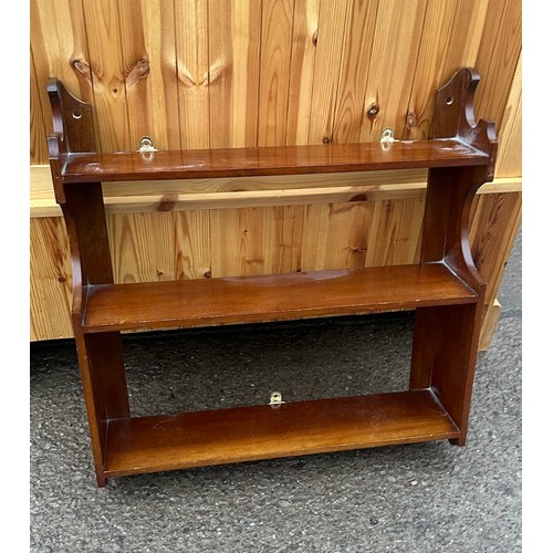 182 - mahogany wall rack measures approximately 23 inches by 23 inches by 5.5 inches