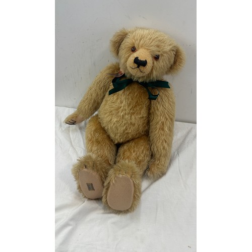 255 - Large golden merrythought/ alpha farnell teddy bear, jointed and with growler labled height 64cms