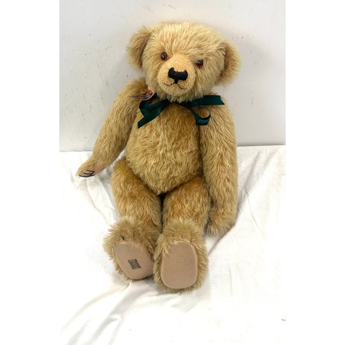 255 - Large golden merrythought/ alpha farnell teddy bear, jointed and with growler labled height 64cms