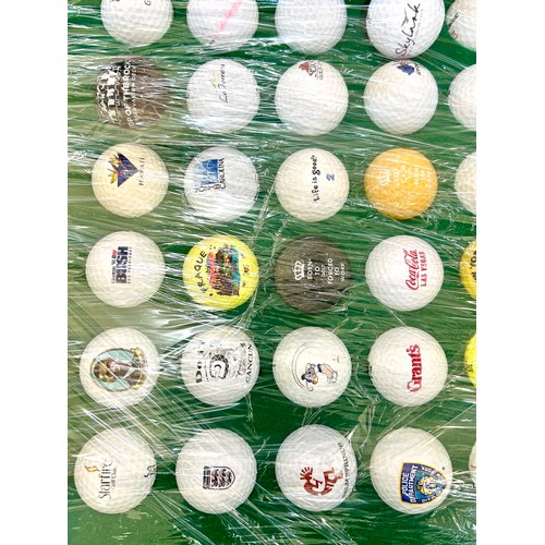 154 - 60 Mounted collectors golf balls consisting of 6 US Open golf balls, 7 US Open ball markers and 1 Ca... 