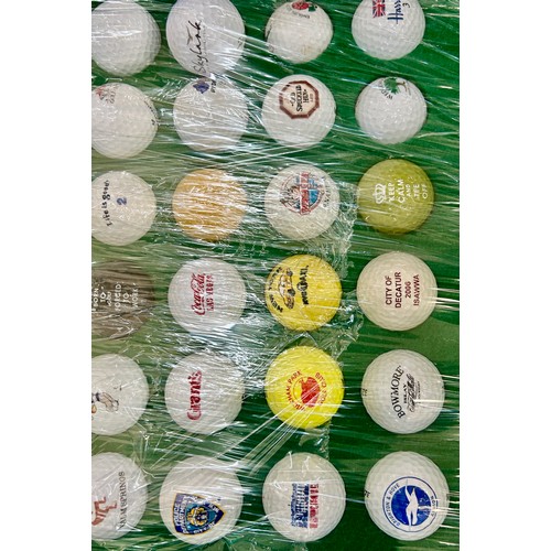 154 - 60 Mounted collectors golf balls consisting of 6 US Open golf balls, 7 US Open ball markers and 1 Ca... 