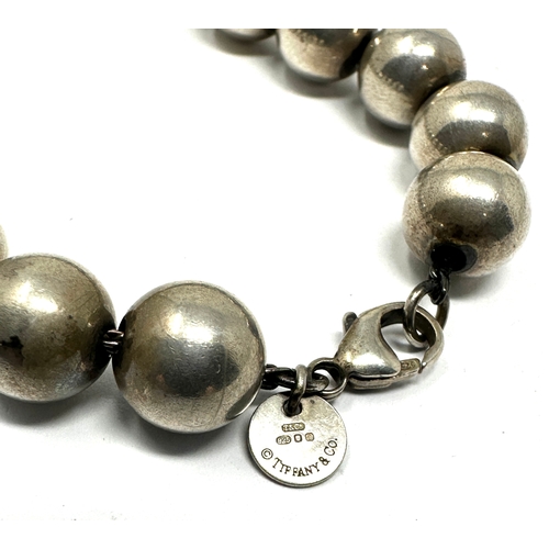 311 - A silver beaded bracelet by Tiffany and Co (19g)