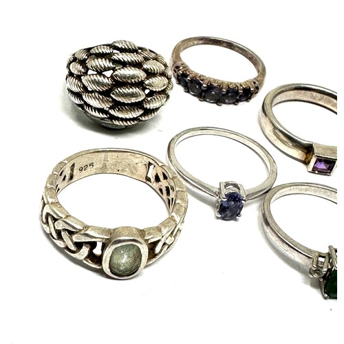 286 - Eight silver stone set rings including emerald and amethyst  (27g)