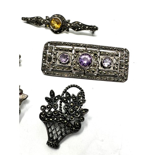 306 - Five silver marcasite set brooches (27g)