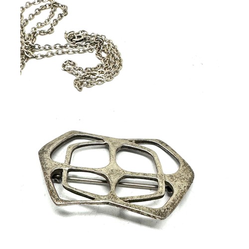 317 - A silver brooch and pendant necklace  (22g)