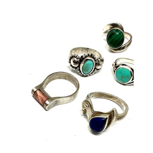 288 - Eight silver stone set rings including turquoise and malachite (34g)