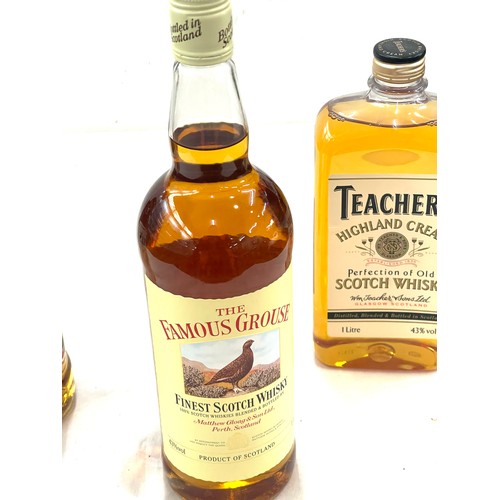 565 - Bottle of Bells, Teachers and Famous Grouse whiskey