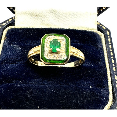 204 - 14ct gold diamond & emerald dress ring with enamel frame (2.5g)