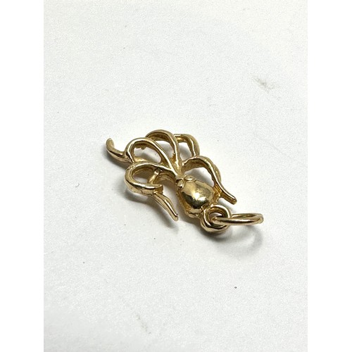 87 - 12ct gold octopus pendant (1.2g)