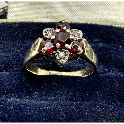 86 - 9ct gold diamond & garnet floral cluster ring (2.6g)