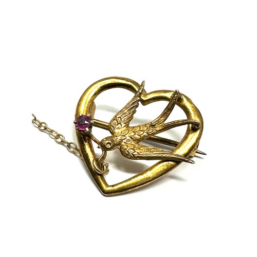 228 - 9ct gold antique ruby bird heart shaped brooch (1.9g)