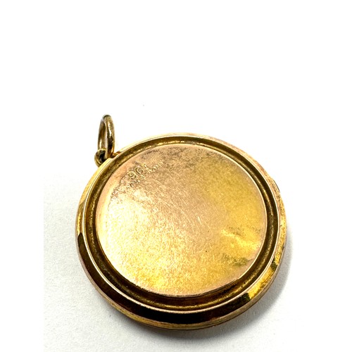 134 - 9ct gold back & front patterned locket (5.4g)