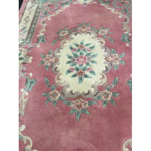 364 - Large  rug measures approximately 98inches by 58 inches