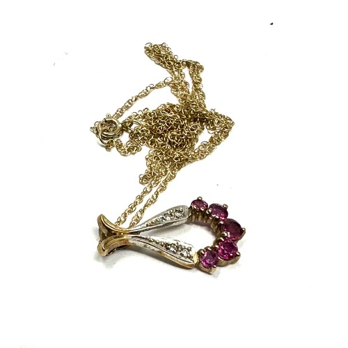 140 - 9ct gold diamond & ruby pendant necklace (2g)