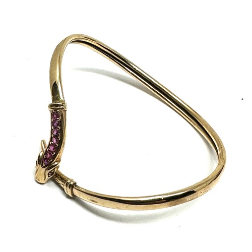 178 - 9ct gold ruby snake bangle (7g)