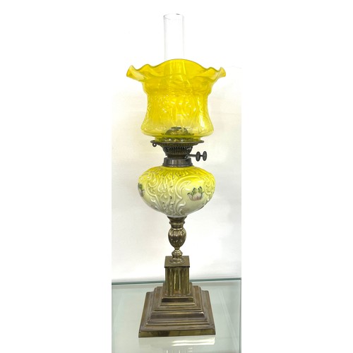 243 - Victorian yellow glass oil lamp, 26 inches tall