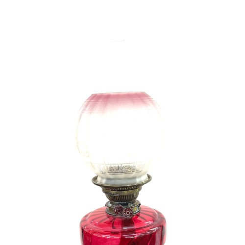 242 - Victorian Ruby glass oil lamp 26 inches tall