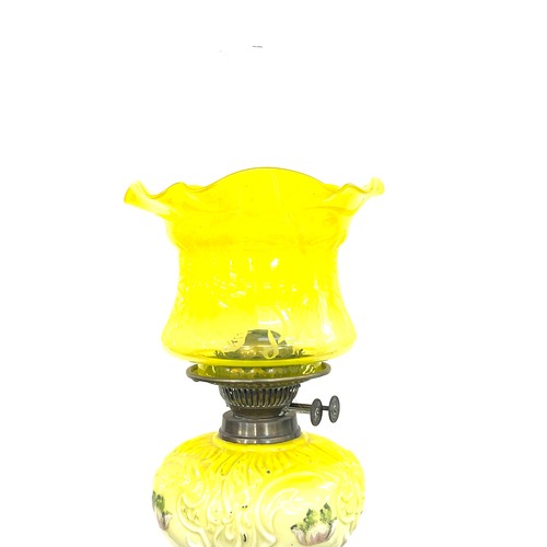 243 - Victorian yellow glass oil lamp, 26 inches tall