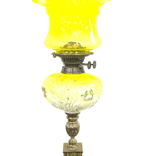 243 - Victorian yellow glass oil lamp, 26 inches tall