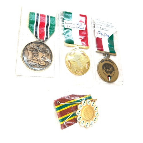 494 - Four medals for the Gulf war- Saudi Combat medal, Bahrain medal for liberation of Kuwait, Kuwait lib... 