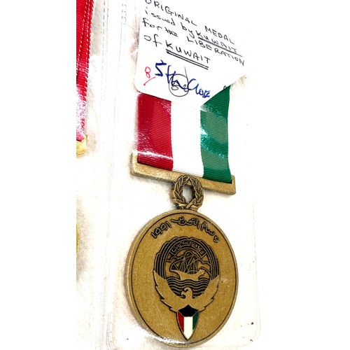 494 - Four medals for the Gulf war- Saudi Combat medal, Bahrain medal for liberation of Kuwait, Kuwait lib... 