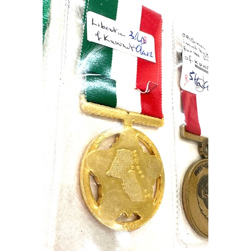 494 - Four medals for the Gulf war- Saudi Combat medal, Bahrain medal for liberation of Kuwait, Kuwait lib... 