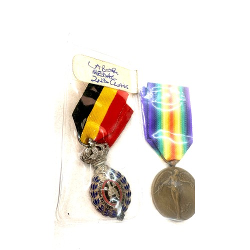 498 - A lot of three Belgium medals to include Victory medal WW1, Labour medal 1st and 2nd class