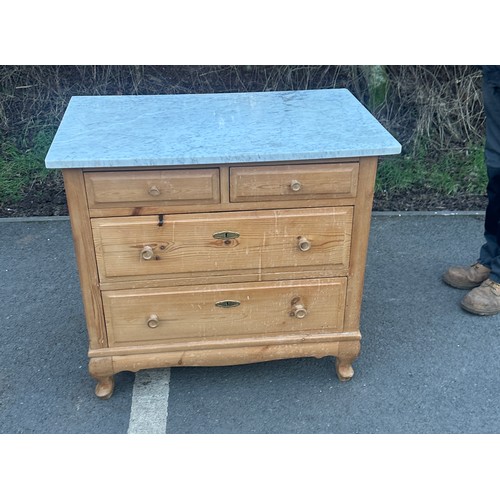 343 - 2 over 2 french stripped pine marble chest of drawers measures approximately 30 inches wide 33 inche... 