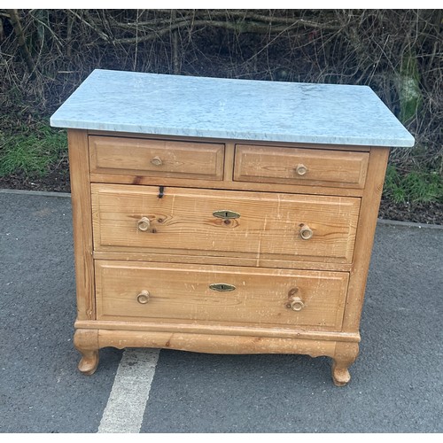 343 - 2 over 2 french stripped pine marble chest of drawers measures approximately 30 inches wide 33 inche... 